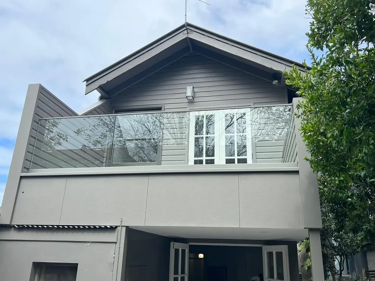 Completed balcony renovation viewed from the garden