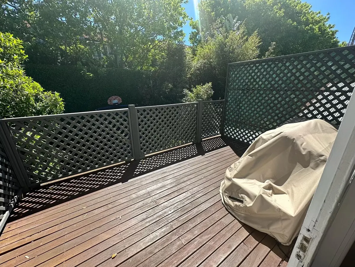 Original balcony decking before renovation