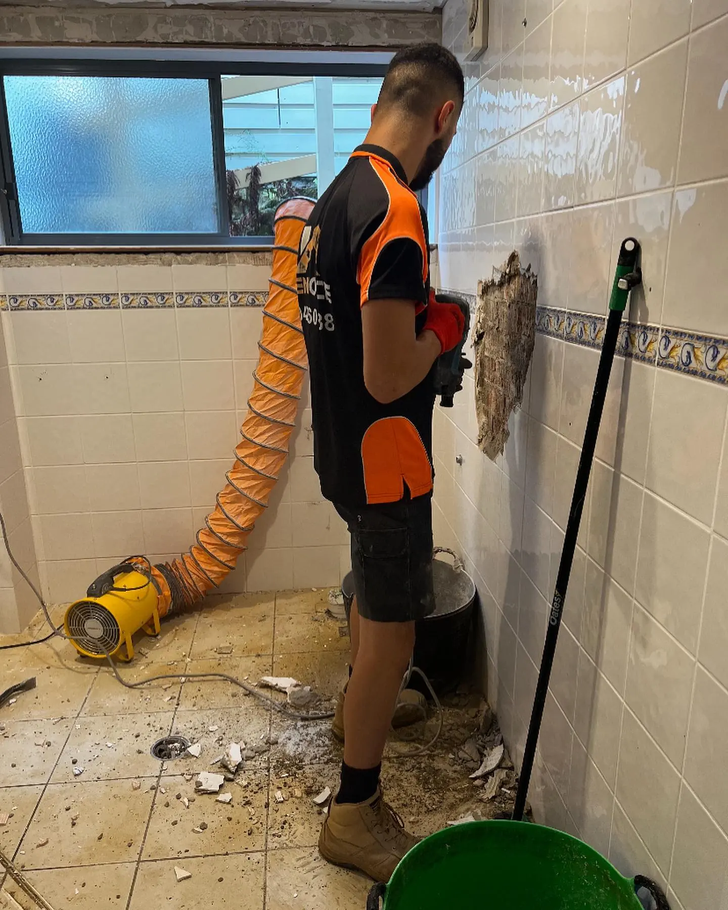 Renoforce team stripping out an existing bathroom