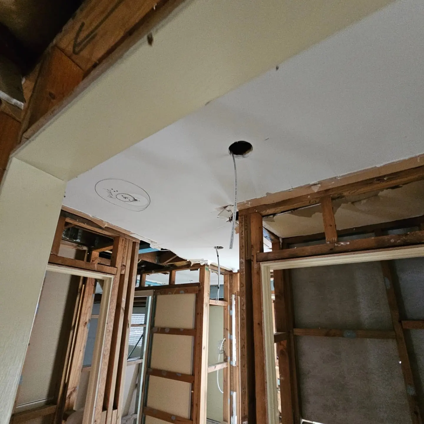 Interior renovation with wall framing exposed